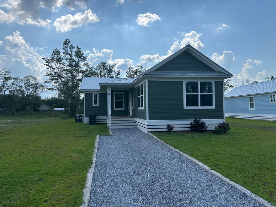 Ready For A New Tenant! 3 bedroom 2 bathroom piling home. This build features vinyl plank flooring throughout the entire home with an open-floor layout. In the kitchen, there are stainless steel appliances, shaker style cabinets & quartz countertops. The master bathroom has a stunning tiled shower and walk-in closet. Call today for a showing!