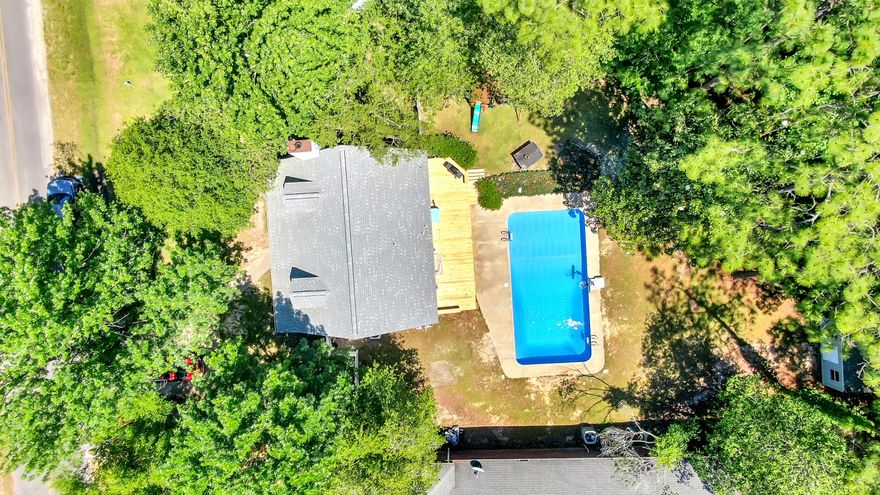 Did we find your unicorn? Perhaps! A 4 bed/2bath pool home in a small, popular neighborhood, on a 1/2 acre just outside of town? Yes, indeed! The pool even has a brand new liner! You'll love the downstairs master with the kids' rooms upstairs. The kitchen is spacious and even has room for an island plus dining area and has lovely views of your back yard and pool! You'll find a brand new deck and in ground pool with new liner. Kids' bedrooms don't skimp on size either! No rear neighbors - just woods, on an extra deep lot. Neighborhood is on the smaller side with winding street, great for walking or bike riding! Qualifies for all types of financing and seller will even gift the buyer $2500 in closing cost assistance with an accepted full price offer. Don't wait to schedule your private tour!