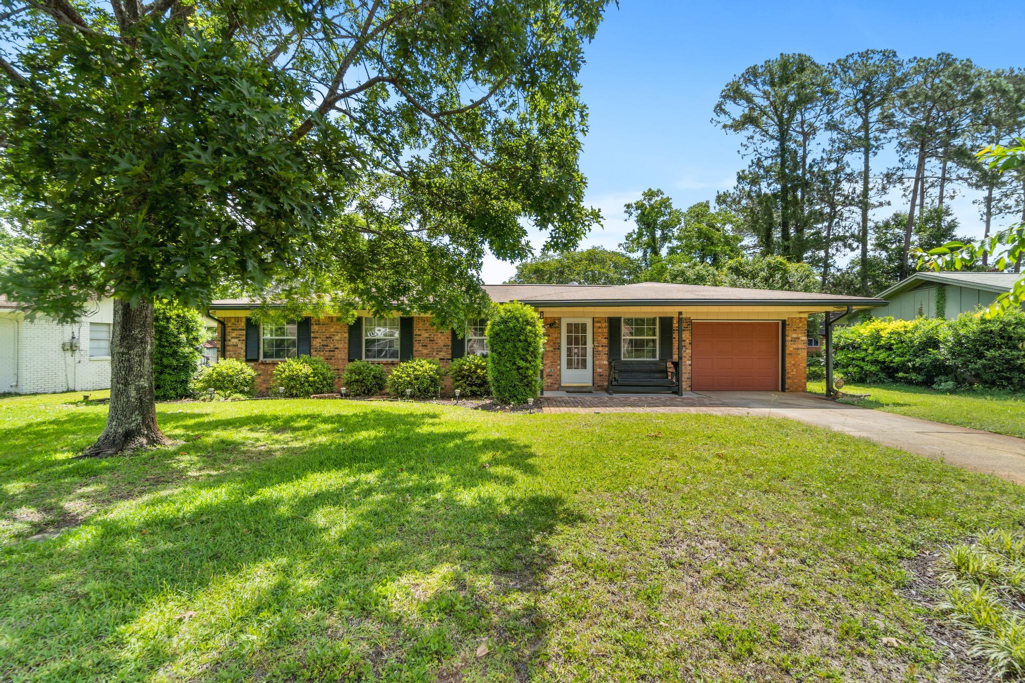 Investment Opportunity! This one owner home in the heart of Niceville could be yours with a little love. Beautifully landscaped and well cared for home is calling for its new owners. This home is close to wonderful schools, Eglin, beaches, and shopping. Located in highly sought after Niceville this home needs some TLC to get it back to its glory. The floorpan is a nice 3/2 with a large eat in kitchen that has been updated with new cabinets and a solid surface countertop. Wood floors are in the living room and hallway. New carpet in the 3 bedrooms. The garage has many cabinets for storage. Newer AC. Home is being sold AS IS due to foundation issues. Quote has been obtained and is available. Perfect home for rentals or updated to call your own!