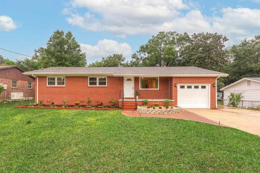 Looking for the perfect house, move-in ready? Located less than 2 miles away from local boat docks, fishing piers, and parks. As you walk up the 7-car driveway, you'll see two, very low maintenance flower beds, filled to perfection. Imagine sitting in your covered-front porch, reading, or taking an afternoon nap. Brand new front door (to be installed on October 5th), original hardwood flooring throughout the main living areas and two of the bedrooms. Great living room/den area with high beams and outlets already in place for an epic sound system. Brand new AC unit has been installed in Florida room. Enjoy the unlimited access to hot water, with your tankless water heater! Solar panels convey with no additional payment as they are paid for free and clear! In addition, you'll enjoy a very fun decorative wall, with floating shelves in the Florida room (great for smaller plants). Hallway bathroom includes brand new vanity and mirror. Washer and dryer, along with custom yard shed that has been sealed with anti-slip paint to convey (As-Is). All windows have been replaced with hurricane resistant windows (2015). For more information on home, view documents tab!