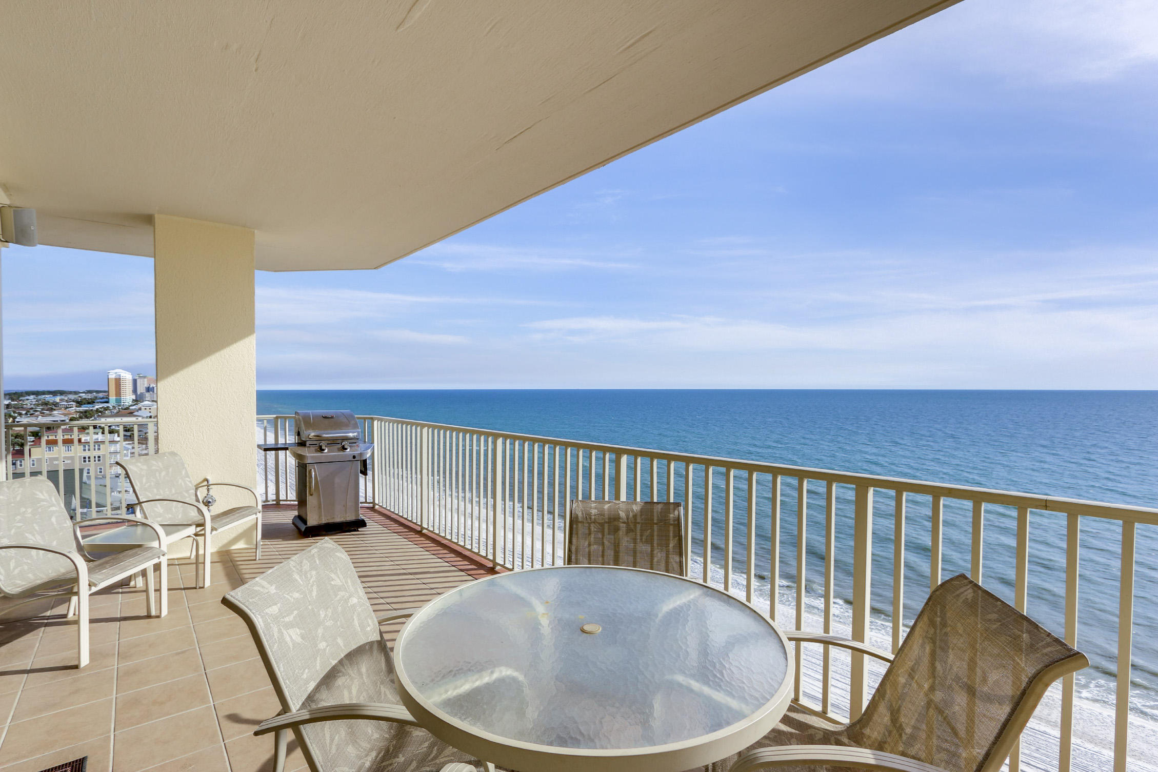 Located directly on the World's Most Beautiful Beach, Grand Surf Club is a small, gated community that offers what most other condos along the beach can't PRIVACY!! With only 2 units per floor, 26 in the entire building, you can relax & enjoy the beach or time at the gulf front pool away from the crowds. 9E is a beautifully decorated, meticulously maintained & will surpass all your expectations. The massive balcony not only allows for everyone to gather & enjoy the view, it also offers a natural gas connection allowing the grill master to show off his skills without having to leave the party. A large living room with a floor to ceiling windows allows the view to come inside. A gulf front master suite allows you to wake up in the morning to the all the beauty the area has to of
