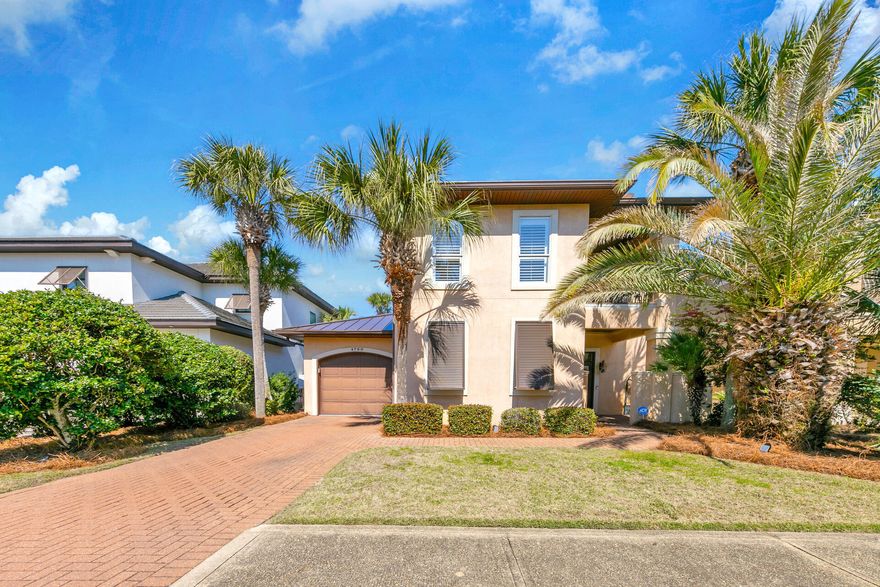 BRAND NEW METAL ROOF INSTALLED FEBRUARY 2025.  Beautifully maintained home in the gated private community of Destiny East. Located less than 150 yards to the community's great amenities such as one of the pools, club house, fitness center, and more. As soon as you pull up you will notice the lush landscaping and mature trees. Entering through the semi-private foyer, you are greeted by stunning natural light from the double French doors to the back patio and the many shadow box windows. The shiplap accent wall in the living room adds to the coastal charm of the home as well. The kitchen features granite countertops, large breakfast bar, loads of counter and cabinet space, and all stainless-steel appliances. The open living space lets everyone be together in the dining area, living area, and kitchen. On the 1st floor you also have a guest bedroom with private access to the shared guest bath. Headed to the second level, you will find at the landing a covered balcony with access from the landing and the master bedroom. The 2 upstairs bedrooms have both been updated with tile flooring. The master bath has been completely renovated including a large walk-in shower with bench and brick walls. The 2nd guest bedroom has its own private bathroom which has also been remodeled with new sink and fixtures. 
Back downstairs, we have the large outdoor area. Right out the door we have the covered porch with grilling area. Off the porch is the large paver patio with access to the greenway which leads to the community's amenities.  The home is being offered unfurnished, however many of the furnishings are negotiable.
The private community of Destiny East offers many amenities such as two community pools (one located at the club house and one located on Scenic Highway 98 overlooking the lake), hot tub, children's playground, fitness center, theater room, tennis courts, and a large, beautifully decorated club house, great for hosting those big get togethers! Destiny East is located on the east end of Destin with so many options for shopping, dining, entertainment, and much more. Easily take a golf cart to restaurants right outside the community's gate, or down to the beach! All within five miles you will find the Destin Commons, Crab Trap, Silver Shells Outlet, Seascape, and so much more. 
