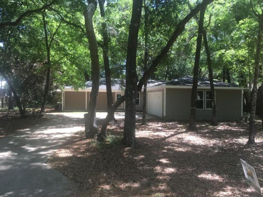 Spacious three bedroom, all with walk in closets, and 2 bathroom home in the quiet neighborhood of Waterview Cove. Just remodeled with new flooring and kitchen with new cabinets, counter tops and appliances, fresh paint and move in ready clean! No pets, but room for toys. ZeroScape Landscaping on a beautiful canopied lot across the street from the awesome Alaqua Bayou.