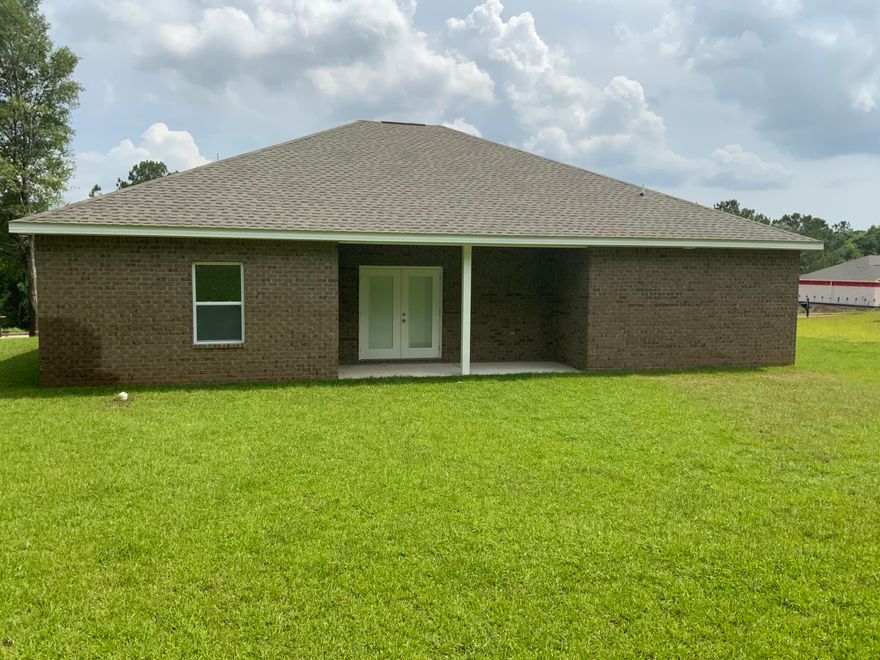 BRAND NEW AND CENTRALLY LOCATED, cul-de-sac location for low traffic and sitting on half acre lot.  This home features Luxury Vinyl Plank in common areas, carpet in bedrooms, corner pantry in kitchen with quartz countertops, work island w/bar seating, soft close drawers and doors on all shaker style cabinetry, stainless steel appliances, brushed nickel fixtures, double vanities in both bathrooms, tiled walk-in shower in master bathroom, large laundry room, covered rear porch for entertaining and relaxing, all brick construction with June completion date.