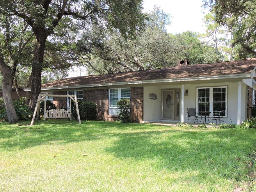 Immaculately maintained home in the heart of Niceville, super convenient to schools, shopping, & military bases. Spacious and UPDATED kitchen with SS appliances, newer counters & flooring. Family room & Den have updated hardwood flooring. A beautiful fireplace adorns the family room with a custom mantel. All bedrooms have newer carpet. Master bedroom suite has a brand new GORGEOUS bathroom & large master closet! NO POPCORN ceilings in this home! Back yard is an OASIS perfect for entertaining, beautifully landscaped with large oak trees & a luscious lawn, & large deck giving you a serene and private space. In addition to the 2-car garage, driveway has been expanded - enough space for 6 cars, an RV and/or a boat! Windows (2018), Roof 2009, HVAC (2005), Gas water heater (2012).