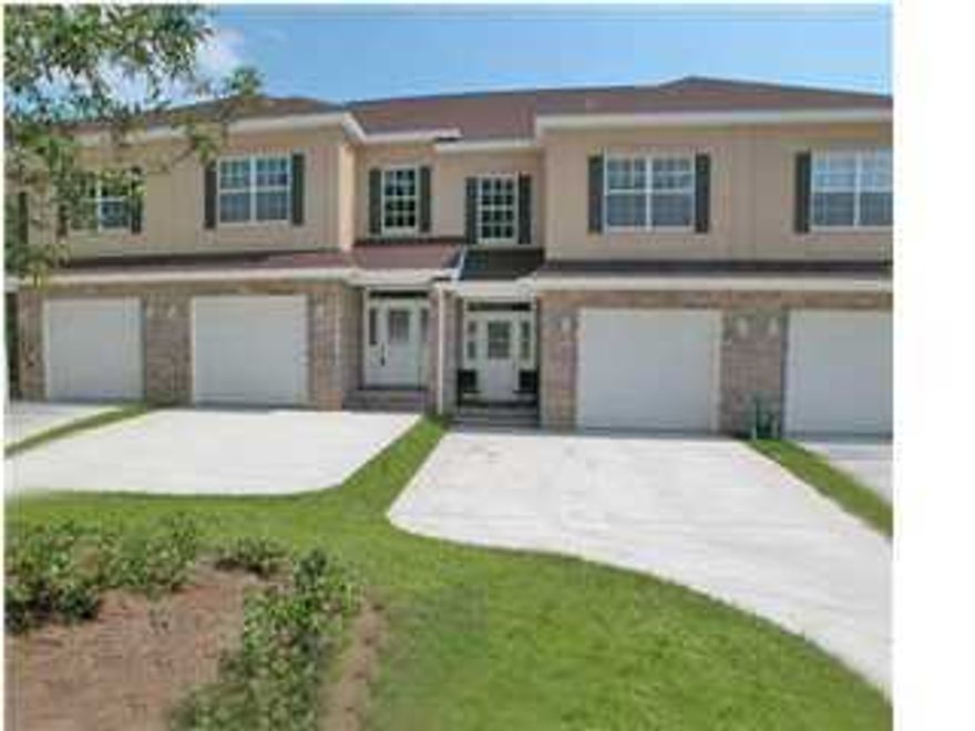 This maintenance free and well insulated townhouse is going to make your life a whole lot easier. In a close community surrounded by nature with a communal gazebo and to enjoy a yard you never have to cut! It is a 3 minute drive/10 minute walk to the incredible Turkey Creek facilities with a large pavilion perfect for birthday parties and a beautiful long boardwalk winding over the large creek with informative nature and wildlife markers and swimming decks. The home itself is the perfect blend of functional and spacious. You enter into a tiled foyer leading into the open living and kitchen area. The living space is carpeted with a beautiful fireplace. Pictures are of another unit.