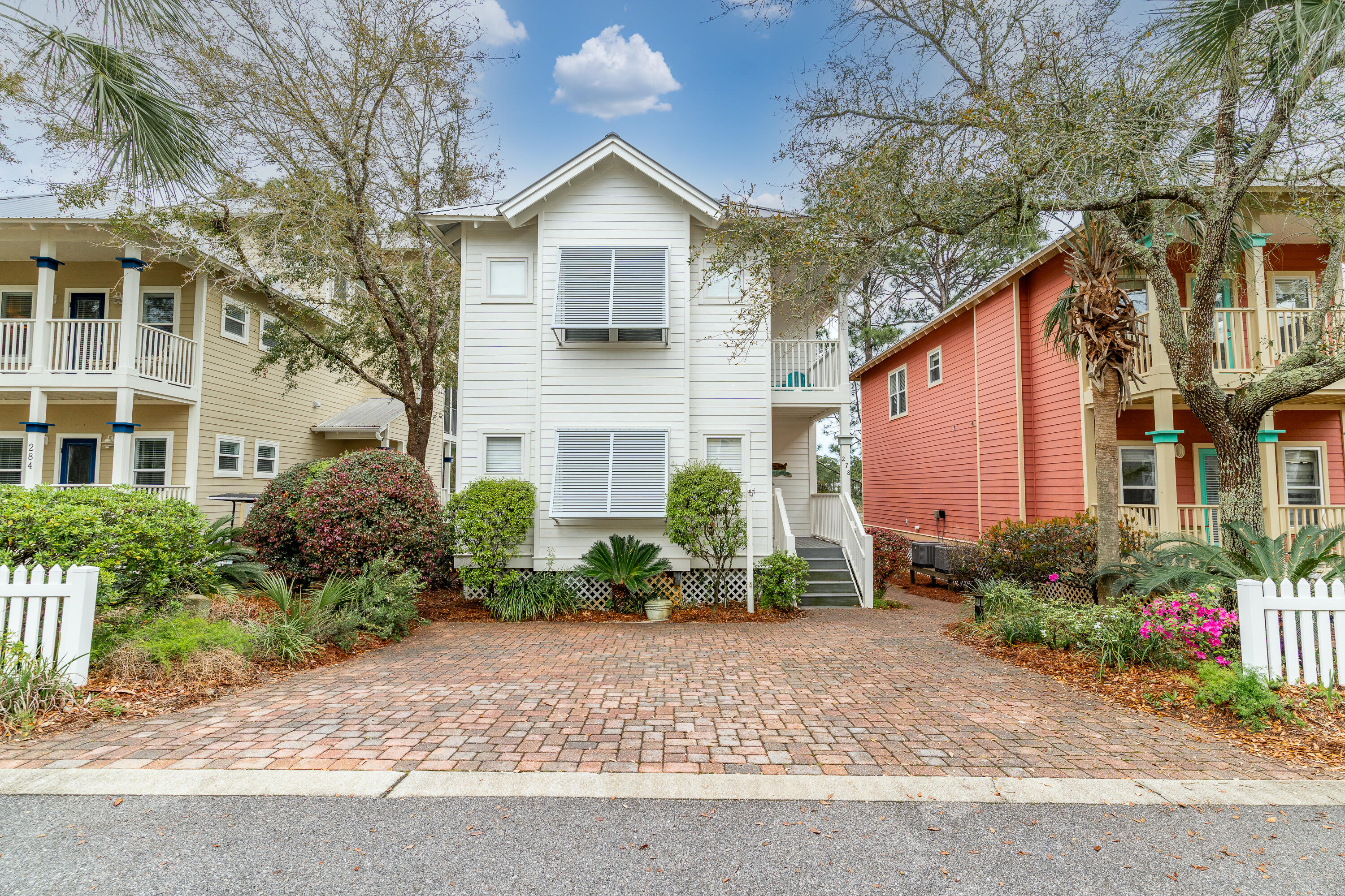 Welcome to your beautiful coastal getaway on 30A, located in the charming neighborhood of Old Florida Village. Overlooking a peaceful lake, this stunning home features a newly renovated kitchen equipped with brand-new appliances, stylishly updated bathrooms adorned with carefully chosen luxury tiles, fresh paint, and brand-new high-end furnishings throughout, creating a modern and welcoming vibe for guests. New paver patio with gas grill.Old Florida Village is a hidden treasure on 30A, where white picket fences, paved walkways, and lush greenery foster a friendly atmosphere for both residents and visitors alike. This community radiates a sense of togetherness and calm, making it one of the area's best-kept secrets. A highlight of Old Florida Village is its two community pools.