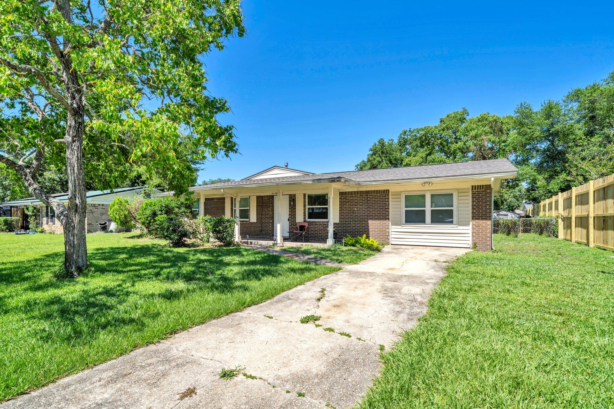 Welcome to 181 Brewer Circle, a charming property located in the heart of Fort Walton Beach, FL. This cozy 3-bedroom, 2-bathroom home is situated on a spacious lot. It features a traditional floor plan that's perfect for families. Step inside and you'll find a comfortable living room with plenty of natural light. The kitchen and dining areas are open and allow great entertainment for guests. The bedrooms are all generously sized and offer plenty of closet space. The back porch is covered and screened for those hot summer days. The backyard is nicely shaded and large enough to install a pool in the future. Conveniently located just minutes from the beach, shopping, dining, and a short walk to local schools.