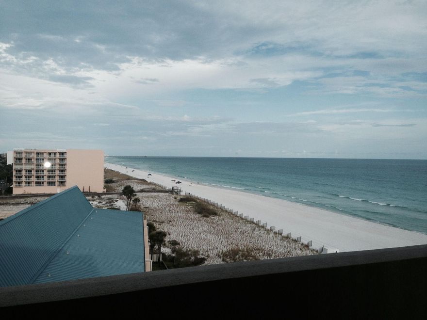 This unit is a corner unit and has a rap around view from the living area and have views from the other two bedrooms. Beautiful white sandy beaches and a pool and spa as well as the health fitness room. This unit is nicely furnished and is a must see.