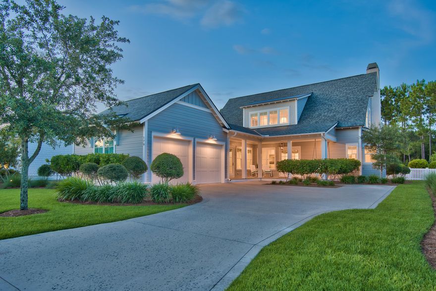 Experience the pinnacle of pure luxury with this beautifully crafted Jason Romair home in one of the best locations within Watersound Origins.  This bespoke designer home has been meticulously curated with the finest finishes and is being offered completely furnished with professional decor inspired by light whites and hues of soft blue.  The Cape-Cod design features its own private oasis including an oversized back yard, heated salt-water swimming pool & spa, and an outdoor fireplace/cabana that backs up to forever green space, creating the ultimate sense of privacy.  Situated on the south side of Splash Drive, the ample spacing provided by this section of Watersound Origins is truly unique and quiet.  179 Splash Drive features 4 bedrooms with en-suite bathrooms, a bunk room, wrap