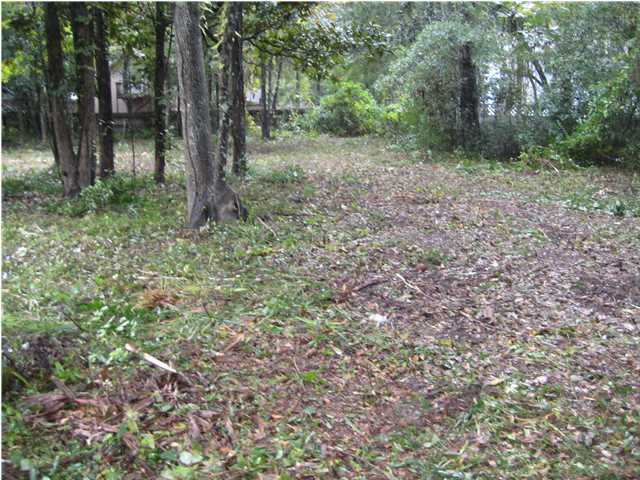 REDUCED, REDUCED. Vacant single family residential lot in a small subdivision of very nice comparable homes. Underground utilities, street lights, architectural guidelines, and very low association fees. There is no build-out time requirement. This lot offers privacy and is located on a slight curve and measures approximately .40 of an acre. The location is convenient to grocery stores, retail outlets, hospital and excellent fire and rescue services. This is your opportunity to own a beautiful lot with mature trees that is close to the Bay and the Gulf.