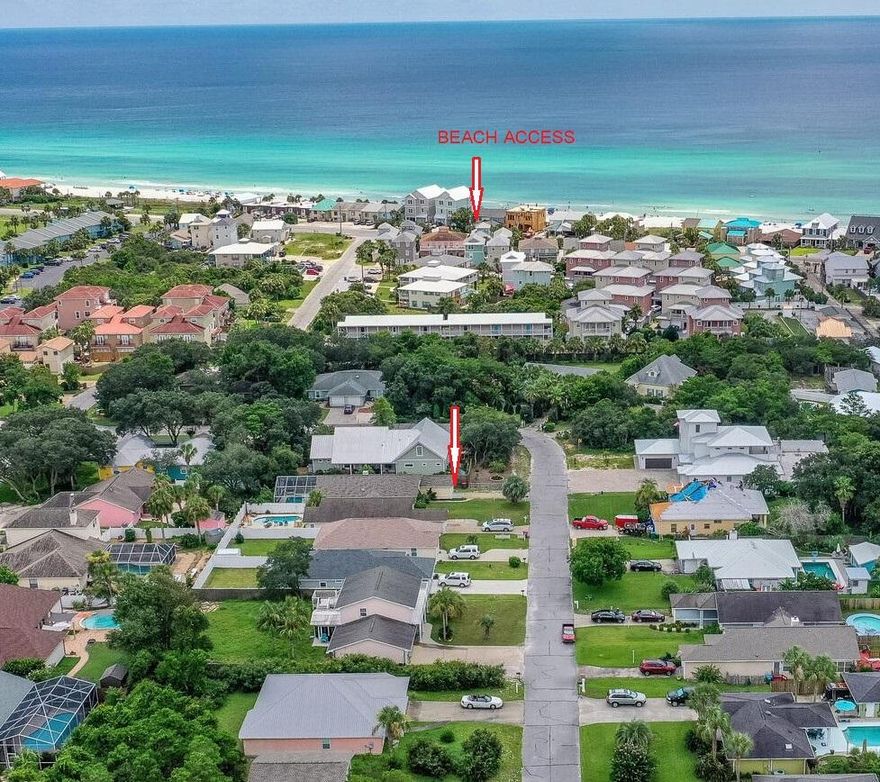 CURRENTLY UNDER CONTRACT, SELLER ACCEPTING BACKUP OFFERS. This lovely 2 bed/ 2 bath (plus Florida room) home is located on the west end of Panama City Beach. Within walking distance to the sugar white beaches and emerald waters of the Gulf of Mexico, this home is nestled on a peaceful quiet street in Southfields. Fantastic location that is close to 30A, Pier Park, restaurants, shopping, and the airport. The property features an open living/ dining/ kitchen design with vaulted ceiling. The fireplace add a charming, cozy feel to the space. Spacious master bedroom offers en-suite master bathroom with walk-in closet for convenience and privacy. The house boasts many upgrades which include fresh painted interior, upgraded light fixtures, quartz countertops in the kitchen and all bathrooms, painted all cabinets, brand new Samsung stainless steel appliances (including refrigerator) and new plumbing fixtures. Roof was replaced in 2018. Stove has a gas ready connection in place if owner decides to run gas to home. The Florida room (that could be used as bedroom but no closet) leads out to side decking and screen- enclosed pool. Being sold fully furnished and tastefully decorated it's ready to be your vacation, second or primary home. Great rental numbers making this property a compelling investment, rental history is available. This is a family and golf cart friendly community. No HOA. Flood zone X. All info is approx. and must be verified by Buyers.