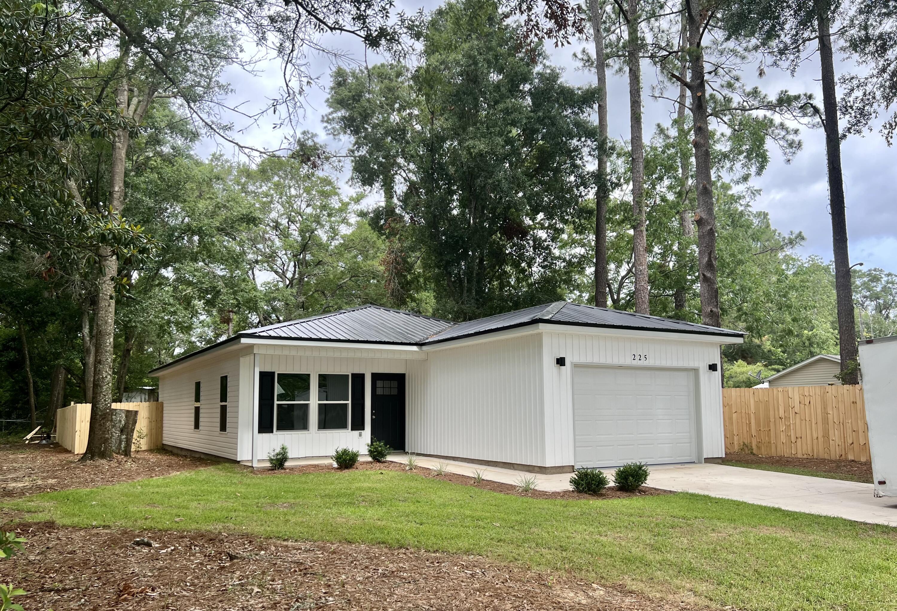 NO HOAs! This 2024 new construction home is located in the heart of Crestview near Northwood Elementary School! Back on the market at no fault to Sellers! A short drive to shopping, dining, schools, and much more! Close to I-10 or South on 85 to Duke, Eglin, Destin or Fort Walton Beach. This home is fresh and bright, has loads of storage including a laundry/pantry room with a utility sink (can wash a small pet), walk-in master closet, linen closet and more! The fully-equipped kitchen offers plentiful storage and a great cooking space. Store your lawn and garden supplies in the storage shed. FENCE INSTALLED AND PATIO UPDATED! Garage floor freshly painted! Refrigerator in pictures has been upgraded to service in door! Come see today!