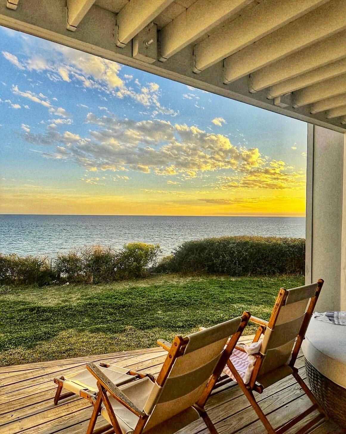 Enjoy the best and highest views on Scenic Highway 30A in this fully renovated two bedroom, two and a half bathroom condo at Sea Bluffs in Blue Mountain Beach. Sea Bluffs is nestled 65 ft above the beach and features private beach access for you and only 19 other condo units. When you enter the unit, you are greeted with gorgeous beach views through the large living room windows. The open concept plan boasts a coastal chic living room, dining room and kitchen on the main floor, in addition to a hallway bunk and a half bathroom. An inviting porch off the living room invites you to enjoy incredible sunrises and sunsets, not to mention access to a full day of playing at the beach. The second floor hosts the master suite and guest suite. Relaxation awaits in the beautiful, oversized master suite with ample sunlight from two sets of sliding doors that lead to the balcony. The master bathroom features a claw foot soaking tub, shower and double vanity complete with marble countertops and floors. The guest suite features a vaulted ceiling and generous space for guests to unwind. The guest bathroom includes an oversized shower with multiple shower heads. The condo can comfortably sleep 10 guests and has actual rental income that exceeds $100K annually. The condo was fully renovated in 2023 with custom cabinetry and solid white oak floors throughout the home, soapstone countertops in the kitchen, V groove and Shiplap walls, Moroccan Zeilege tile, furniture and fixtures from Arteriors, Rejuvenation, Visual Comfort, Pottery Barn, Anthropolgy, and more. Sea Bluffs has an agreement with La Dulce Vita for any beach chairs, umbrellas, bikes, kayaks and more.