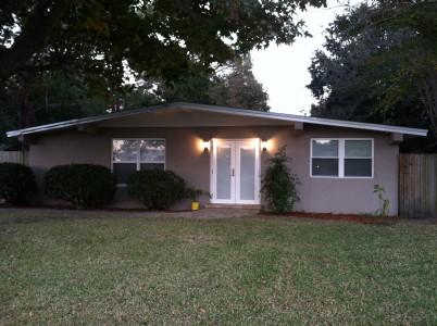 Modern style turn-key home with more than $50,000 in recent upgrades. You're sure to love this high end look with starter home price. Centrally located between Hurlburt Air Force Base & Okaloosa Island. This maintenance free stucco home has tons of curb appeal with a paver sidewalk leading up to the French door entry, but it doesn't stop there, when you step inside you'll be blown away with the attention to detail & upscale remodel done to this home. Bedrooms: the 3 bedrooms & closets are carpeted. Living room: living space & hallway have hardwood floors. Kitchen: tile floors, kitchen has all new cabinets which include a Lazy Susan, all appliances stay with home, including but not limited to front loader washer & dryer located in the laundry room.