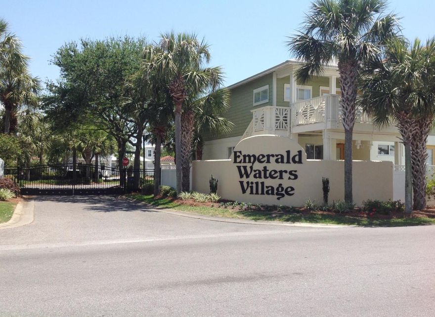 A RARE find! Large Villa lot in the gated community of Emerald Waters Village with deeded beach access! Build your beach dream home AND a carriage house. Or build a duplex, so long as it looks like one residence. Possibilities are endless here. Live in one side, rent the other, rent them both, or build a large, beautiful Estate home. A hot spot for locals and tourists, these homes are rental machines! 2 community pools, deeded beach access, extra guest parking, plus underground utilities. Beautifully maintained grounds with 2 park like areas to sit and relax as well. Water and sewer tap fees are PAID, and there's no build out time! Within 1/2 mile of the beautiful beach, but NOT in a flood zone! Call your builder and grab this lot while you can! Come live in Paradise!