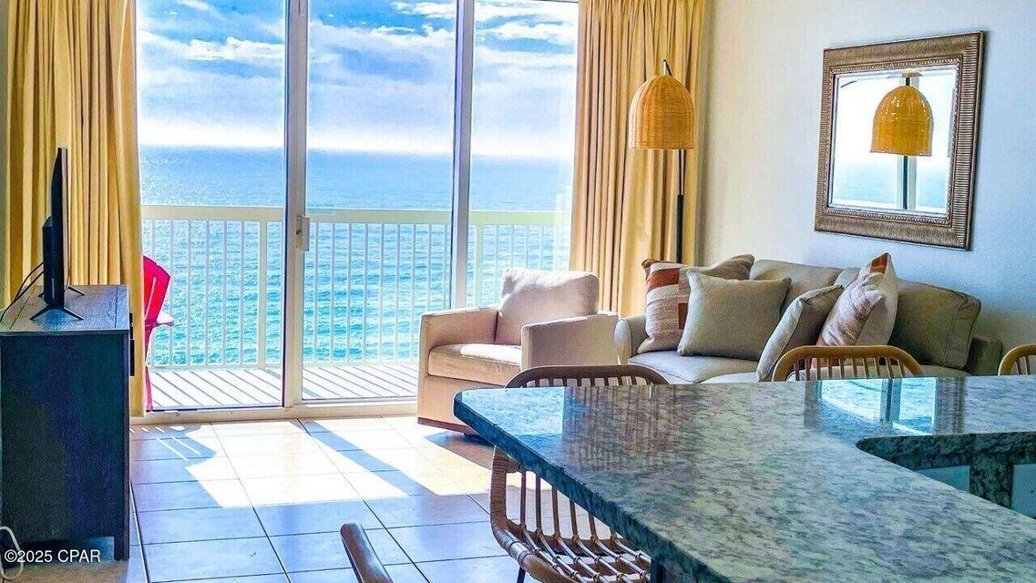 Rental Machine Walk right into a unit that works for you! Completely furnished, on a rental program bringing in a the bacon. Nothing to do, nothing to buy! It;'s all included. Breathtaking views the moment you step inside! The ultra-popular 1205 stack is a hot commodity, and it's easy to see why. The master bedroom offers stunning Gulf views and entrance to the balcony--perfect for that morning coffee or evening sunset. Two bedrooms and two full baths make this condo a cozy yet stylish en- suite with double vanity, granite countertops. The kitchen? Fully upgraded with brand-new appliances, granite counters, and a sleek tile backsplash making cooking as fun as the beach vibes outside. Full Laundry room, for those beach towel dries.Nestled on the quieter West End of the Beach