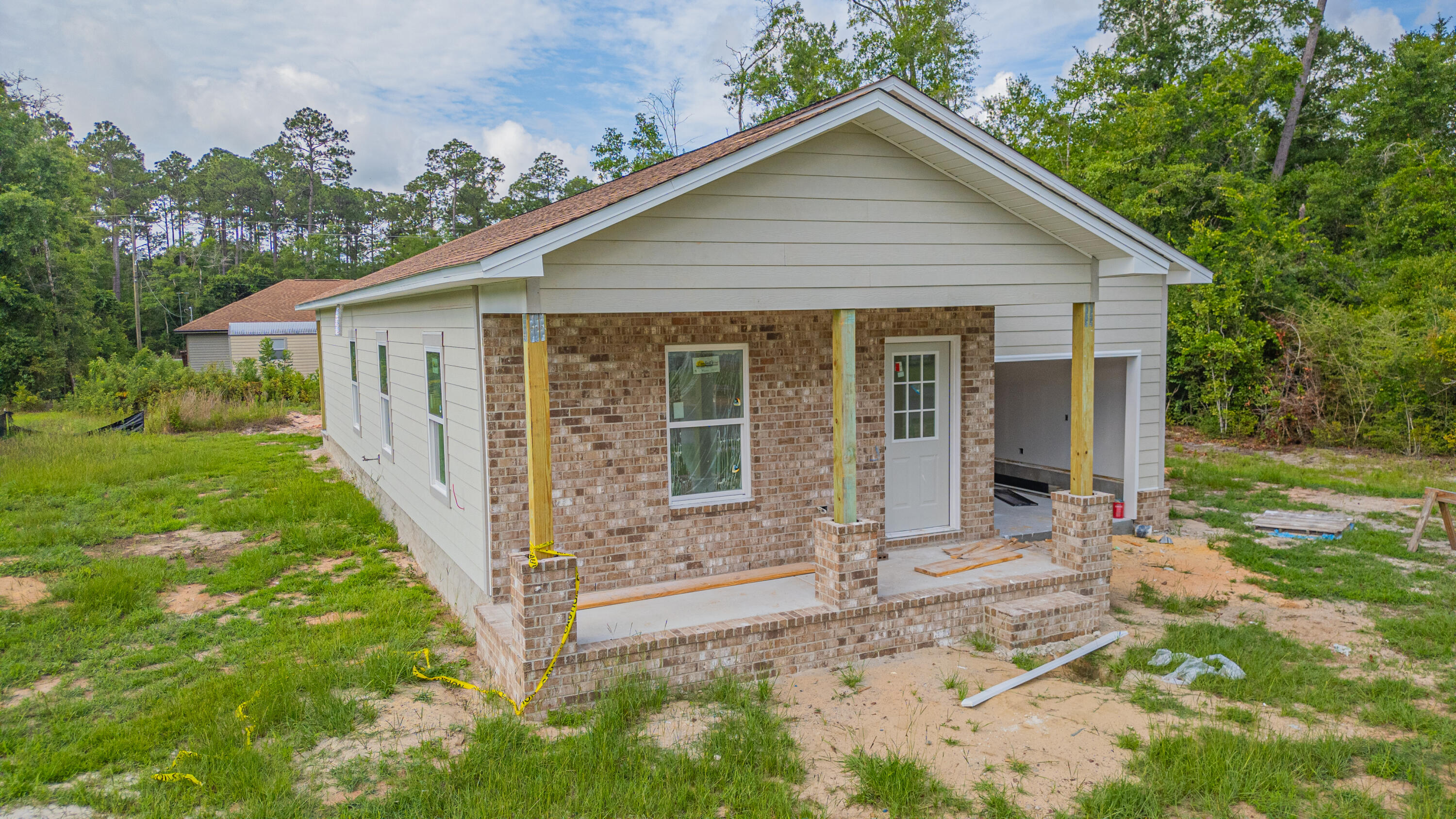 Brand new construction, close to I-10 so easy access to Pensacola or Milton. Brick front with Hardie Board siding, 9' ceiling through out. Luxury vinyl flooring through out, no carpet! Granite counter tops in the kitchen, stainless steel appliances. Large covered porch off the back of the house.