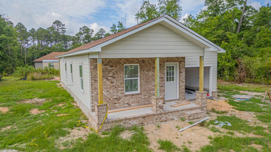 Brand new construction, close to I-10 so easy access to Pensacola or Milton.  Brick front with Hardie Board siding, 9' ceiling through out.  Luxury vinyl flooring through out, no carpet! Granite counter tops in the kitchen, stainless steel appliances. Large covered porch off the back of the house.