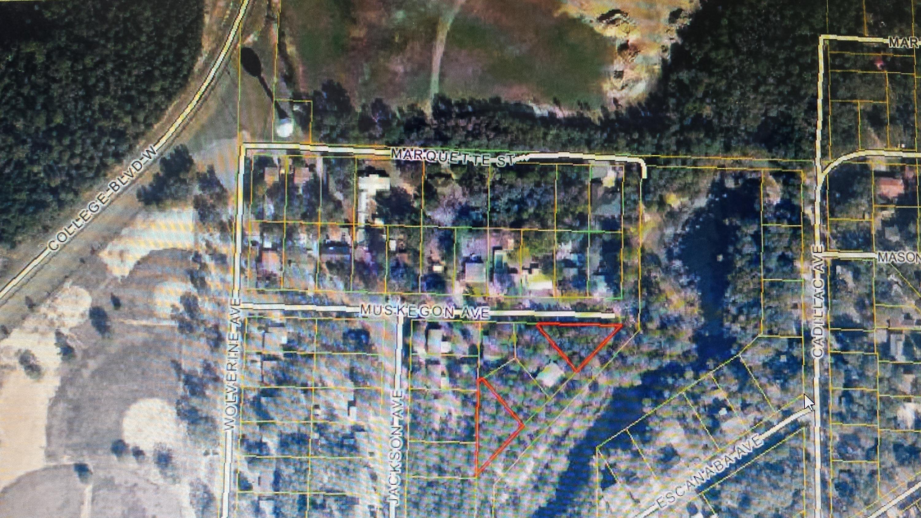 Buyers bring your Builders! Builders bring your plans. Excellent location to build your first home or rental property close to base! Parcel is split into two lots of which only one is actually accessible. Price reflects buyer only being able to make use of the lot accessible by Muskegon Ave. which appears to be half of the acreage of the whole parcel. All information has been taken from property appraisers site. Buyer to verify all details deemed pertinent.