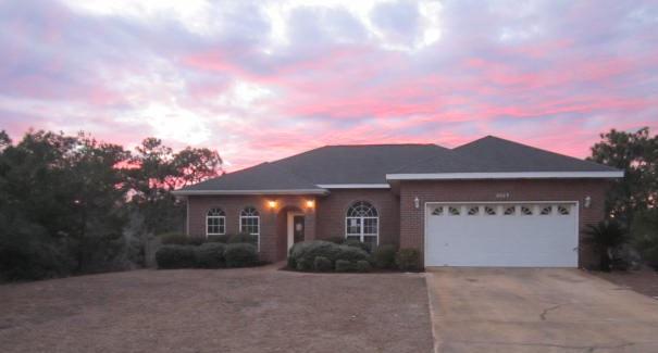 Live in Holley By The Sea and Enjoy All the Amenities! Great Floor Plan on this 3 Bedroom, 2 Full Bath Contemporary Style Brick Home * Breakfast Nook * Formal Dining * Spacious Great Room with Fireplace * Tray Ceiling in Master Bedroom with French Doors to Backyard * Master bath includes garden tub, dual sinks and a separate shower * Popular Split Floor Plan * Patio and Large Fenced Back Yard. Buyer to verify all information deemed important, including but not limited to lot size, home square footage, room sizes, schools and utilities.