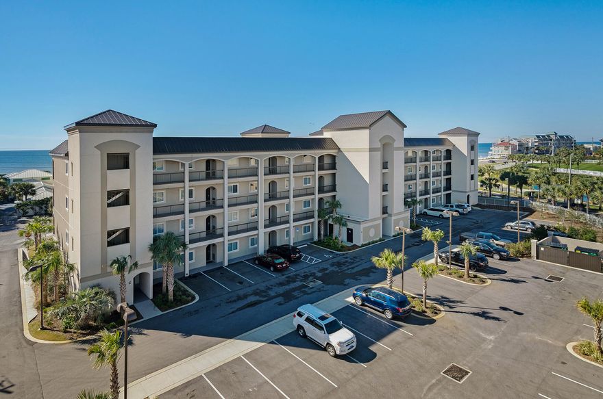 Purchase w/ 10% down. PRICED TO SELL! RESERVED PARKING SPACE! Step into elegance at your NEW privately-gated Beach Condo - Alerio E402! This stunning top-floor, 2-bedroom, 2-bath luxury condo is directly across the street from the sugar-white sands of Miramar Beach. This turnkey, fully furnished residence is a rare find and an unbeatable investment--now is the time to buy your dream beach escape or high-performing rental! Soaring 10-foot ceilings, rich wood flooring, crown molding, and granite countertops throughout give this beach condo an upscale, coastal-chic feel. The chef's kitchen is outfitted with sleek stainless steel appliances, a full-sized washer & dryer, and all the modern conveniences of home. Unwind on your private balcony with morning coffee or sunset cocktails. Read more... The king master suite boasts a spa-inspired ensuite bath with steamy- glass walk-in shower, while the second bedroom features a twin-over-full bunk, plus there's a queen sleeper sofa in the living area comfortably sleeping up to 6 guests.

Located in the gated, upscale community of Alerio, enjoy exclusive amenities including a seasonally heated pool with waterfall feature, hot tub, splash pad, grilling area, and two deeded beach access points - just steps from your door!

You're also within walking distance of Surf Hut and Cabana Caf??, and just a short drive to Silver Sands Premium Outlets and the vibrant Village of Baytowne Wharf for dining, fireworks, and live entertainment. 
You will also have a reserved parking spot + the complex has a separate "Owners Only" section of the parking lot.

Qualified buyers can purchase w/ only 10% down!