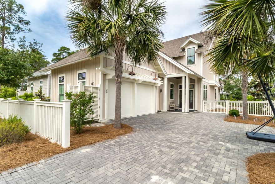 JUST REDUCED $100,000. MOTIVATED SELLER! This stunning home in beautiful WaterSound West Beach was masterfully designed for the coastal lifestyle. Grand entertaining areas with soaring ceilings, abundant windows offering natural light, and beautiful millwork exemplifies the casual elegance. The gourmet kitchen offers a large marble island, Viking Professional appliances, separate wine refrigerator, wet bar and two oversized pantries. The great room opens onto a large screened porch with both sitting and dining areas. This home offers beautiful hardwood floors throughout, custom woodworking, and JELD-WEN hurricane windows and Neuma doors throughout. The first floor spacious master suite includes a well appointed master bath with gorgeous tile work, large soaking tub and oversized marble shower A large sandroom & laundry area complete the 1st floor connecting to the 2 car attached garage and adjacent to the enclosed outdoor shower. The second floor offers a large media area with vaulted ceilings, 2 additional bedrooms both with beautiful ensuite baths, soaring ceilings and walk-in closets. The bunk room has 2 sets of built in bunk beds, another full bath and more storage complete the second floor. The exterior of this beautiful home has recently been repainted as well as parts of the interior. Situated on an oversized lot there is ample room to add a private pool and/or outdoor fire pit. The beautiful gated neighborhood of Watersound West Beach is south of 30A and adjoins Deer Lake State Park, promising unrivaled opportunities for kayaking, paddle boarding, fishing and nature walks. Amenities include: private deeded beach access, beautiful zero entry community pool with clubhouse, outdoor grill and fireplace, lovely parks, miles of boardwalks and access to the WaterSound Beach Fitness center.