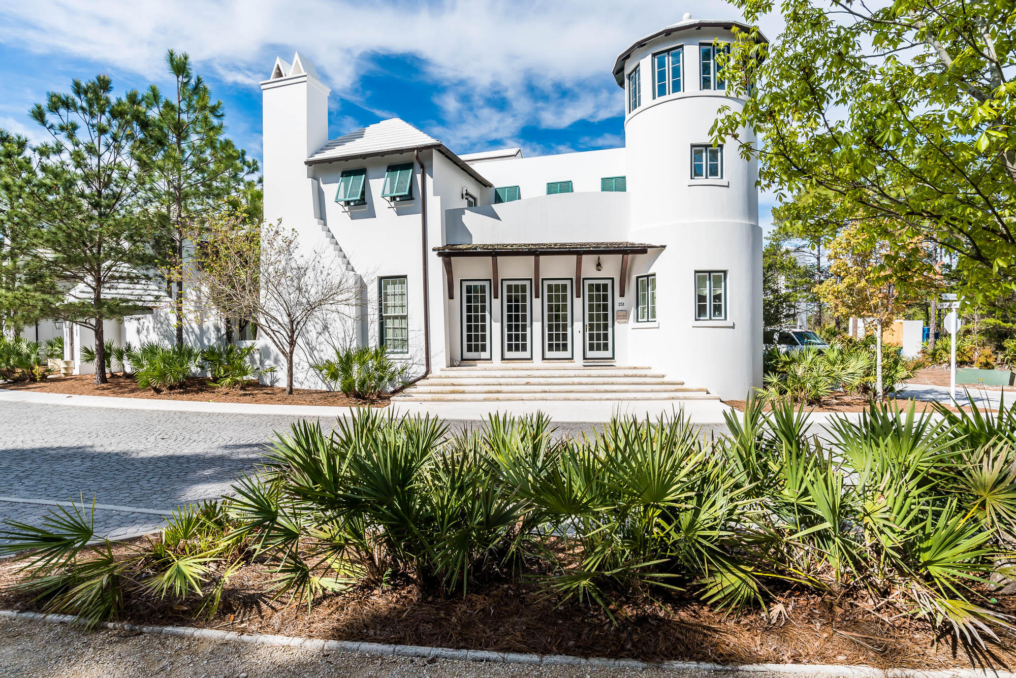 Villa Le Blanc is a beautiful and spacious 5-bedroom, 5.5-bath villa in the gorgeous community of Alys Beach. Surrounded on two sides by pristine parkland, the home is located across the street from the breathtaking Caliza Pool and Restaurant and is an easy walk to The Gulf Green beach access. The kitchen has an open floor plan and featuring Wolf & Sub-Zero appliances. The bright and open living room is aligned with a gas fireplace. Just steps away, through large French doors, is the beautiful private courtyard complete with dining banquette, sparkling pool and fountain, and plenty of outdoor seating for lounging and relaxing. The first floor also features a one-bedroom suite with private bath, bright entry gallery and a cozy reading nook. On the second floor, the master bedroom