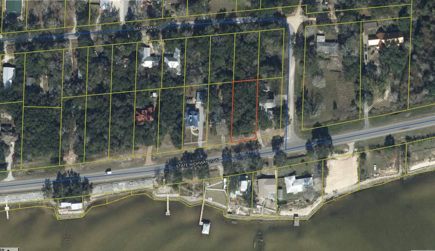 BAY VIEWS and the seller is MOTIVATED!!! Here's your opportunity to own a 0.33 acre lot strategically located on Highway 20, offering the ease of accessibility from both the Mid-Bay Bridge and HWY 331. This lot boasts a convenient location with no assessment fees, making it an ideal blank canvas for your next venture.Situated in a surprisingly tranquil area despite its highway frontage, this lot provides the perfect blend of accessibility and peaceful surroundings, not to mention the views of the Choctawhatchee Bay which is located right across the street.Don't miss out on this rare chance to secure a valuable piece of Highway 20 real estate.  Schedule your private viewing today!