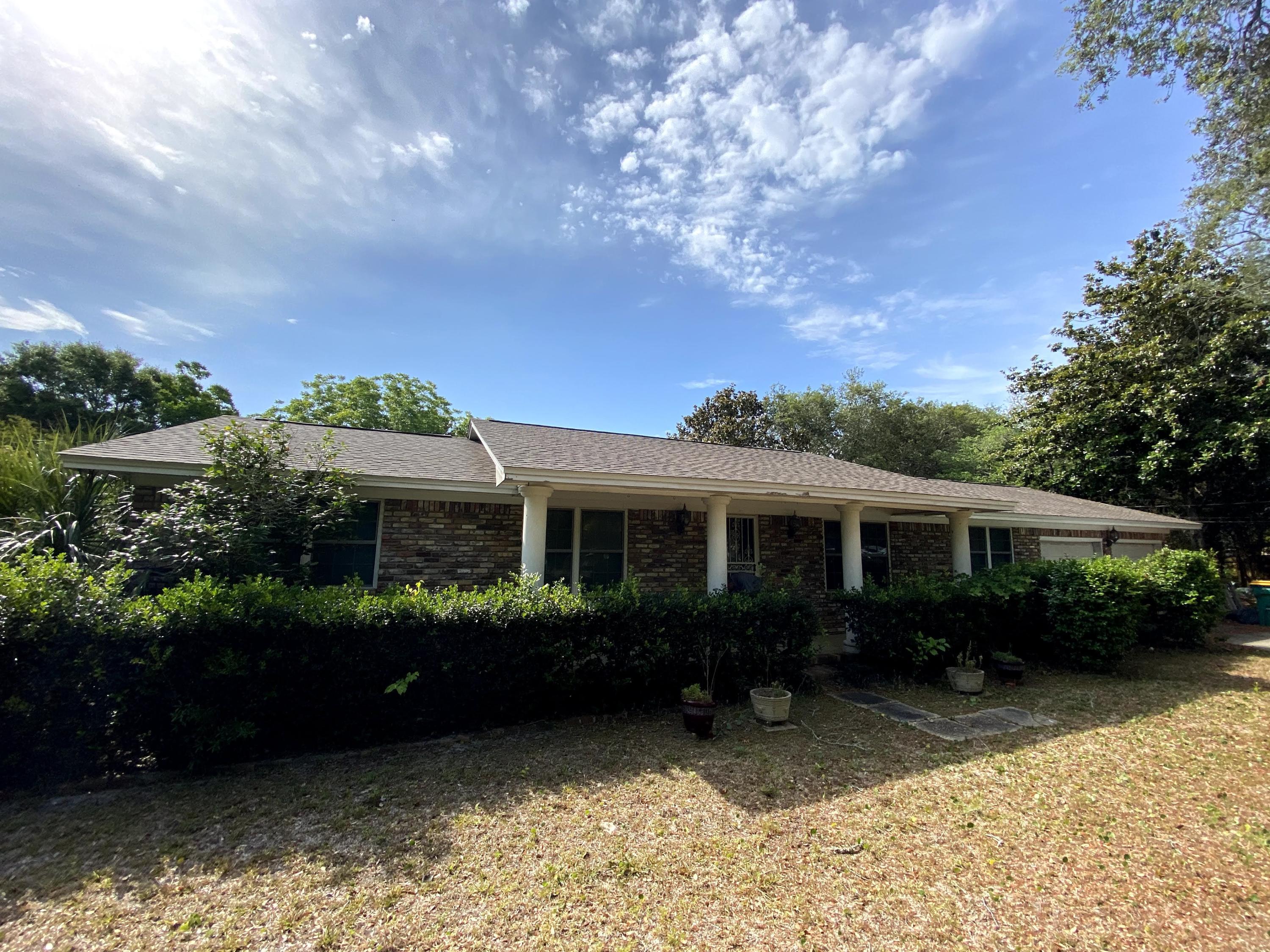 Home sold with minimal updates 'AS IS'. All Electrical Re-wired and new Electrical Main panel added (2020). Home & Yard cleaned/cleared. Roof 2 years old (2018/2019), AC 2012. Property Has 2 Car Garage Attached and 2 Car Garage Detached and Shed. Lot size over 1/2 Acre (0.69). New Dishwasher, New Light Fixtures and Fans.