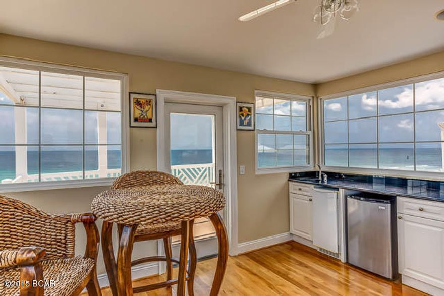 Gorgeous 5 bedroom 3.5 bath home within steps of the Gulf! This home features panoramic views of the sparking white sand beaches! Inside you'll find spacious living on 4 levels! The main level has 2BR/1BA and a two car garage. 2nd level boasts a nice size living area with built-in shelves, entertainment center and fireplace. The well appointed kitchen features granite counters and SS appliances with lots of cabinet space. This is an open floor plan with dining right off the kitchen with additional seating at the long breakfast bar. On the 3rd level you'll find the master suite and 2 additional bedrooms and a bath. Level 4 features panoramic views of the beaches with continuous windows. An outside deck gives a bird's eye view of the sugar white sand and emerald green waters.