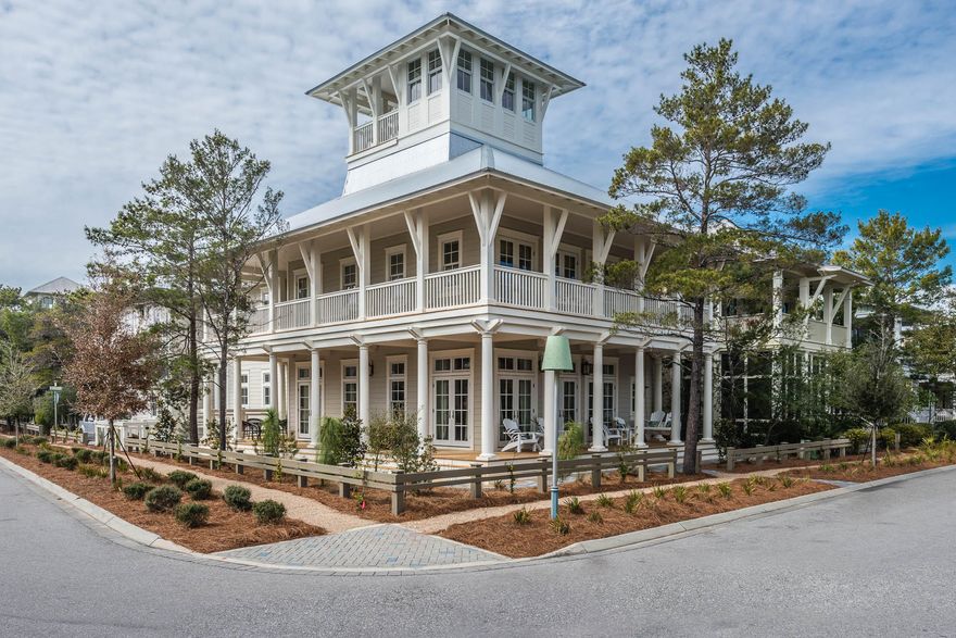 This spectacular home is the epitome of coastal elegance and antebellum charm. It's situated on a corner lot in Phase III in world-famous Water Color, Florida, known for its idyllic beaches, shopping, dining, and coastal lifestyle. Newly built with exquisite attention to detail, 118 Scrub Oak Circle offers four bedrooms in the main house and one bedroom in the carriage house, perfect for up to 16 guests! It is also offered fully-furnished with high-end decor and furniture. There was no luxury spared in the design and furnishing of this 4,400 square foot home, with crown molding and re-claimed antique hardwood floors throughout. The lap-siding and exposed wood beam rafters in the main living space add to the coastal chic ambience.