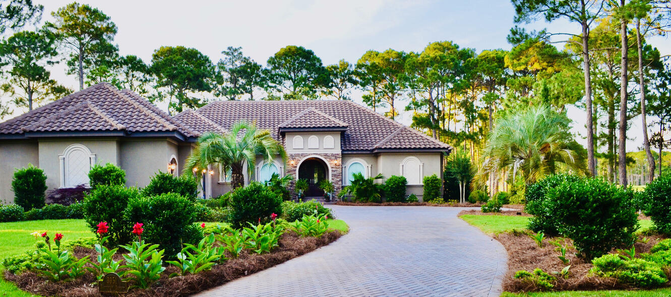 One Level 2014 3bdrm w/office custom Mediterranean inspired home by Compass builders. Home sits on an exceptional picturesque half acre lot with room for a pool. Steps away from the Raven Golf Course located between holes 14 & 15. Across the street from Island Green hole 6 & lake w/cascading fountain which can be viewed from the stunning mahogany front double doors & front facing windows w/plantation shutters. Open floor plan with coffered ceilings in the kitchen, dining room, & family room. Cooking enthusiasts, this kitchen is sure to please, prep your meals on the expansive island w/granite countertops. Plenty of cabinets along with a generous size pantry to satisfy storage needs. Appliances include gas range top, double ovens, a new refrigerator & new dishwasher both under warranty.