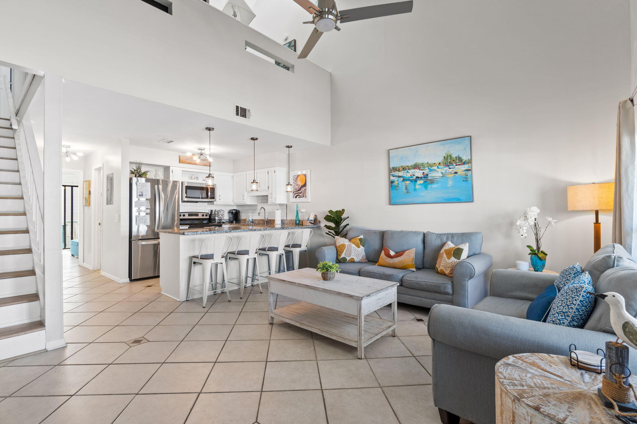 Experience the best of coastal living in this beautifully designed loft-style condo at Southwind in Panama City Beach. Perfect as a second home or investment property, this fully furnished retreat blends modern comfort with coastal charm.The open living area features vaulted ceilings, abundant natural light, and stylish furnishings, while the well-equipped kitchen flows seamlessly for easy entertaining. The primary suite includes a private balcony--perfect for relaxing with sunset views and glimpses of the Gulf.Southwind offers a community pool and is just steps from public beach access. Ideally located near Pier Park, Gulf World Marine Park, and Frank Brown Park, with quick access to Hwy 79 and only 20 minutes to Northwest Florida Beaches International Airport. Move-in ready and rental-ready, this condo is your opportunity to enjoy or invest in the best of Panama City Beach.