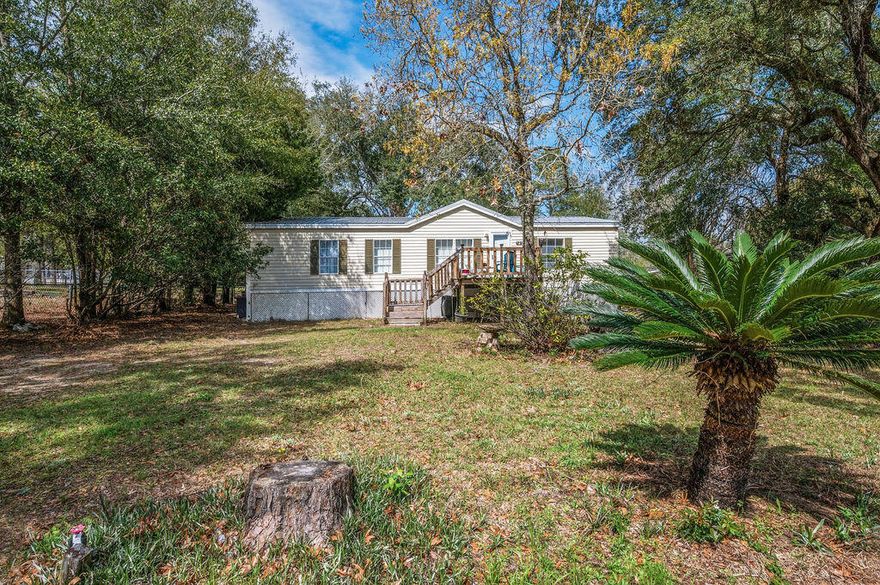 Live near the bay without the bay-front price! This updated 3 bedroom, 2 bathroom manufactured home is located just A1/2 mile from beautiful Choctawhatchee Bay, offering easy access to boating, fishing, and coastal living. Conveniently located 3 miles from the Mid-Bay Bridge, 10.9 miles to the Emerald Coast beaches, & 18 miles to Eglin Air Force Base. Major updates include a METAL ROOF, HVAC, Flooring, Dishwasher, & Kitchen Cabinets all replaced in 2020. The Water Heater replaced in 2022. Fully repainted in 2026. The property offers dual access with the front entry from Beech St & backyard access from Willow, plus RV hookups with 30amp electric, water, and sewer already in place. Work shed is also included. A great opportunity for a primary home, vacation getaway, or investment near the water