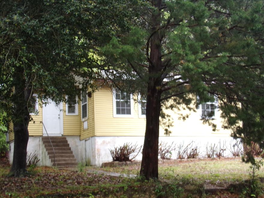 Adorable home that would be great for a starter home~ 2 bedroom, 1 bath in town just down the street from Northwood Elementary~ New refrigerator, range & microwave~ Metal roof installed in 2012~ This would make a great starter home or investment/rental property~ Being sold ''As Is''