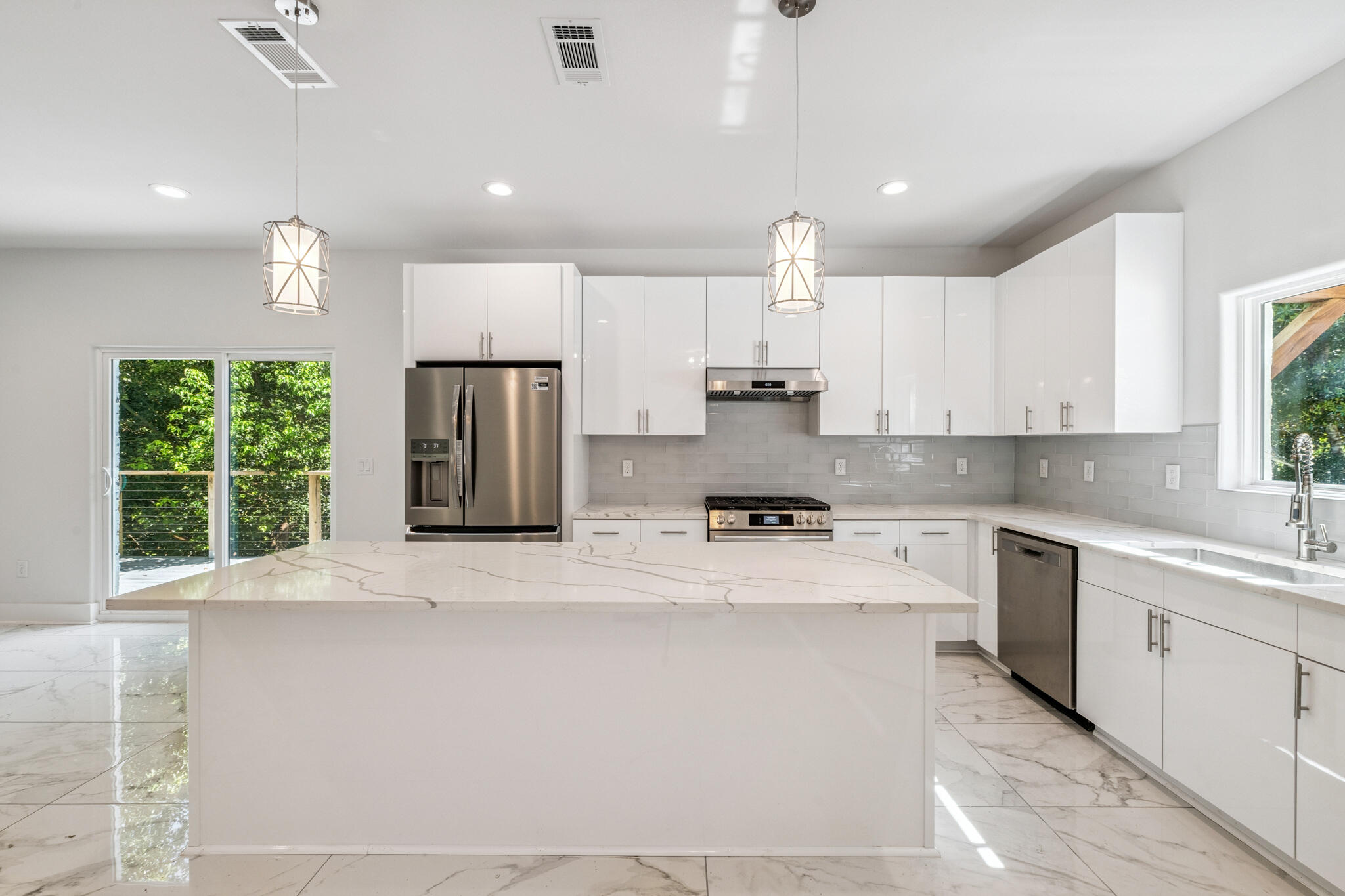 Stunning New Construction Home - Completed in 2025! Nestled on a serene 0.74-acre lot, this brand-new 5-bedroom, 3.5-bathroom home seamlessly blends luxury, comfort, and modern design. Step inside to discover premium finishes throughout, including, polished porcelain tile downstairs, luxury vinyl plank flooring upstairs and rounded corners for added elegance. The chef's kitchen features sleek quartz countertops, frameless high-gloss Palena White cabinetry, and upgraded stainless steel appliances, including a gas stove, 4-French Door Fridge, and dishwasher. Tankless gas water heater! The exterior showcases German Schmear brick paired with Nichiha shake siding dormers! Expansive composite wraparound deck, with modern wire railing, and gas connection for your grill - - Perfectly perched to overlook the tranquil pond surrounded by trees, offering a natural escape right in your backyard.
Additional highlights include an oversized concrete driveway, gas utilities. Tucked away for privacy yet just minutes from local schools, restaurants, shopping, and military bases, this hidden gem is the ideal balance of peaceful retreat and everyday convenience.
Don't miss your opportunity to own this thoughtfully designed home!