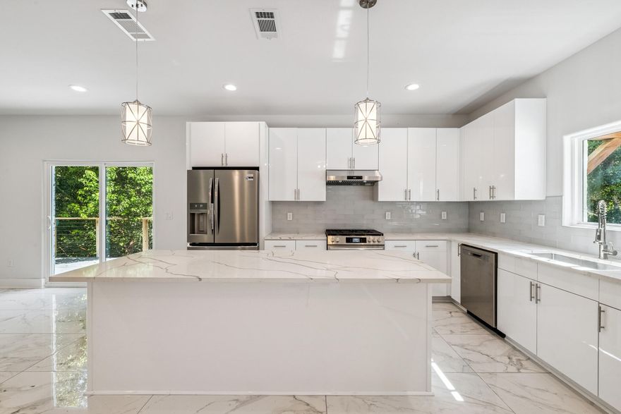 Stunning New Construction Home - Completed in 2025! Nestled on a serene 0.74-acre lot, this brand-new 5-bedroom, 3.5-bathroom home seamlessly blends luxury, comfort, and modern design. Step inside to discover premium finishes throughout, including, polished porcelain tile downstairs, luxury vinyl plank flooring upstairs and rounded corners for added elegance. The chef's kitchen features sleek quartz countertops, frameless high-gloss Palena White cabinetry, and upgraded stainless steel appliances, including a gas stove, 4-French Door Fridge,  and dishwasher. Tankless gas water heater! The exterior showcases German Schmear brick paired with Nichiha shake siding dormers! Expansive composite wraparound deck, with modern wire railing, and gas connection for your grill -  - Perfectly perched to overlook the tranquil pond surrounded by trees, offering a natural escape right in your backyard.

Additional highlights include an oversized concrete driveway, gas utilities. Tucked away for privacy yet just minutes from local schools, restaurants, shopping, and military bases, this hidden gem is the ideal balance of peaceful retreat and everyday convenience.

Don't miss your opportunity to own this thoughtfully designed home!