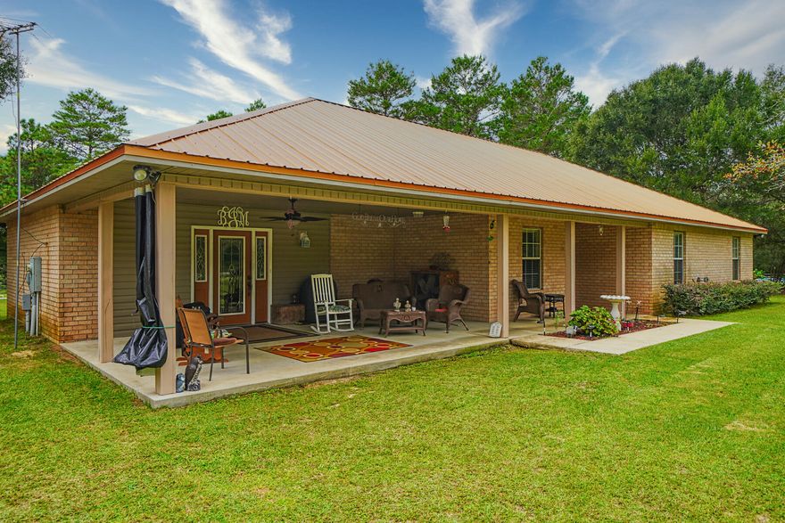Beautiful, private, peaceful and conveniently located to everything! Don't miss the opportunity to own this large brick home on 4+/- Acres! Situated perfectly on a beautifully landscaped yard, you will find this 3/2 home. Features include a large open dining/living room, galley kitchen with solid surface counters, split floor plan, large family room, master bedroom with large master bath including an oversized whirlpool tub! The backyard features a large above ground pool, a fenced in area for pets and the back porch is the perfect place to end the day watching sunsets and deer frolic. Only 20 minutes to Crestview and most of the military bases and just 5 miles to the interstate exchange! Don't miss out on this one! Call for your tour today. Please allow 24 hours for appointments to view.