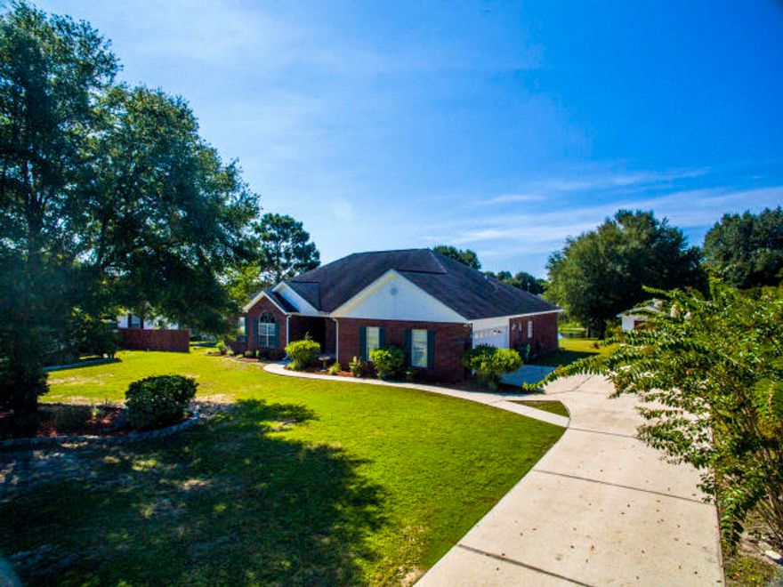 This split bedroom home offers beautiful picturesque view of the lake from the back deck. Home features grand master suite with separate tub and walk in shower, spacious guest bedrooms with walk in closets, and formal living & dining areas complete with sparkling chandelier. The family room has vaulted ceilings with tons of overhead lighting and two ceiling fans as well as a tile accented wood burning fireplace and large mantel. You will enjoy the large florida room that leads out onto the large open deck, perfect for enjoying the view of the lake. Long driveway with side entry 2 car garage plus a storage shed with electric and lots of shelving at the end of the driveway. Sorry NO pets allowed. Any person 18 years old or older must submit separate applications.  Tenants required to carry renter's liability insurance while occupying the home