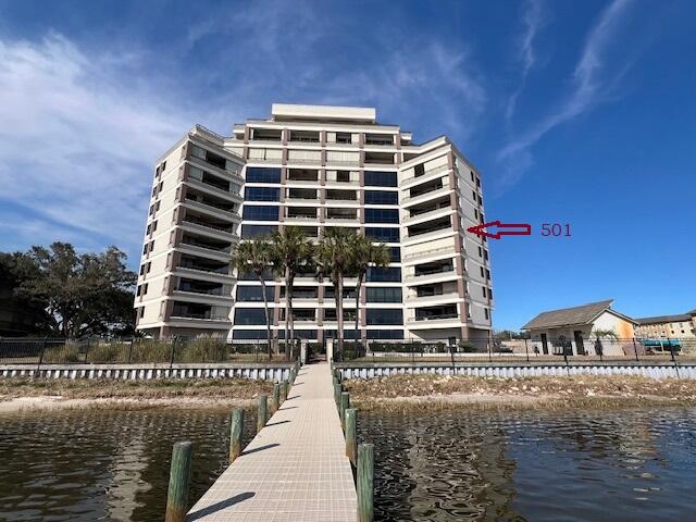 Wonderful South Facing 23' long Balcony has a 180 degree view from East to West for spectacular sunsets and sunrises! This Move-In-Ready, Waterfront Condo is a Dream Come True! 200 West is a Peaceful Non-Rental Building located in the heart of Fort Walton Beach on the Intracoastal Waterway. #501 has assigned/covered parking, Deeded Boat slip w/lift & TONS of Storage! Amazing Upgrades: Luxury Vinyl Plank Flooring throughout, 9-foot ceilings, Upgraded Kitchen and Baths! The Large Laundry room has a newer HVAC system and newer water heater. Kitchen has Custom Cabinets with pull-outs for efficient storage, Upgraded Appliances, Gorgeous Granite countertops and a Breakfast Bar! There is a bonus 'Dining' room at the entrance that can be used for any purpose. The Living Room is Enormous with lots of Natural Light. The Master is Waterfront with a Bonus area (also waterfront!) currently used for exercise equipment. Each of the Three Bedrooms have their own Bath and Large closets. There are two step-in Showers and one Guest Bath has a Garden Tub. Fabulous outdoor living amenities including a tiled balcony with panoramic views and a community pool! Several Major upgrades were done to the building a few years ago, including new windows in all three bedrooms! The Abundant Storage with amaze you! Pets up to 25lbs allowed. Call to schedule your showing today!