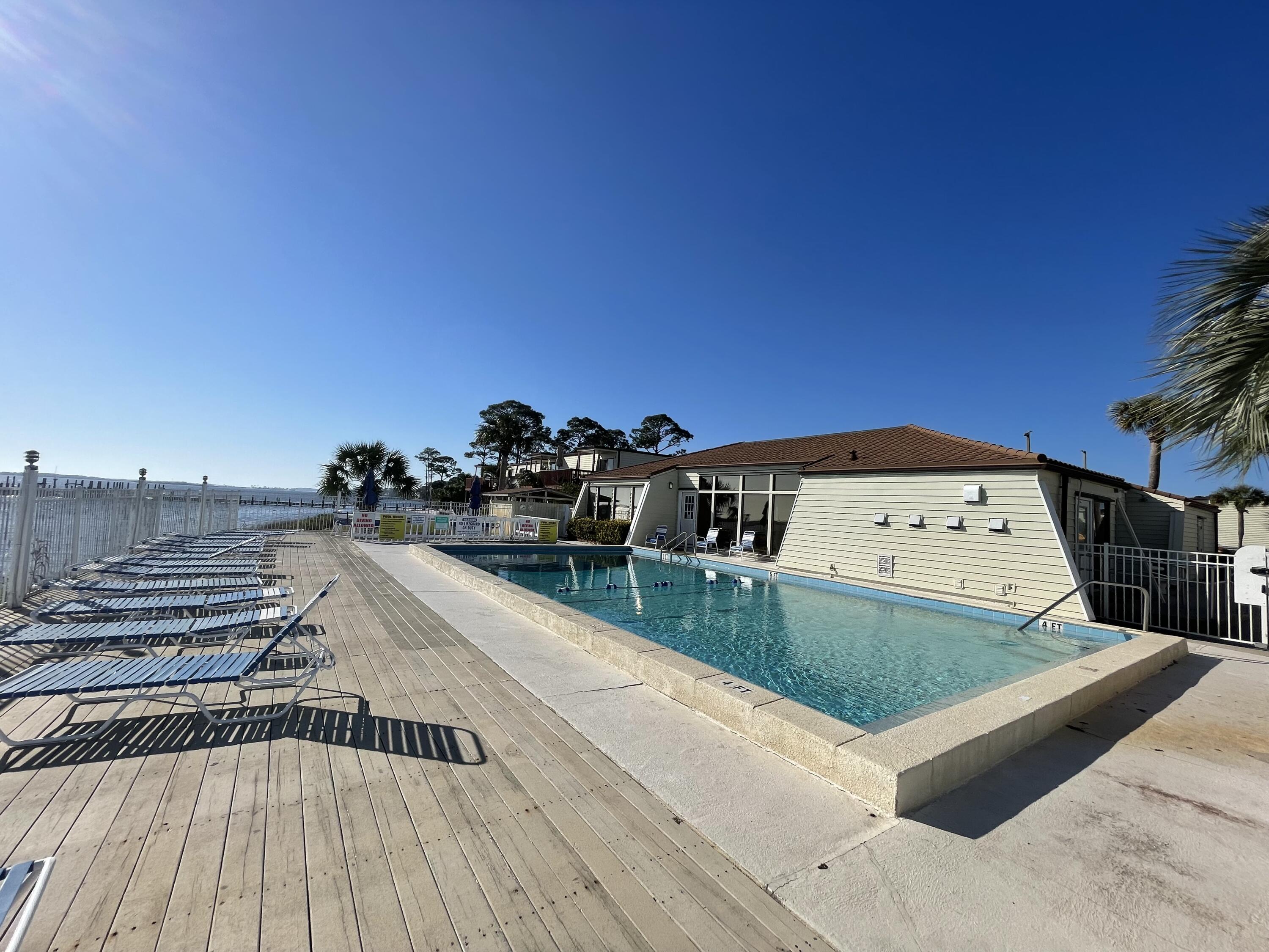 Paradise Awaits!! Enjoy the condo life in this 2 bedroom, 1 bath condo w/ an open floor plan, Located on the ground floor of building 24 at Fountainhead, this end unit has direct access to the tennis courts & just a few steps away from the clubhouse. The clubhouse features a kitchen, tv area, and a pool table. The Laundry Room is onsite by the clubhouse alongside the pool, dock, private beach, all boasting views of the beautiful Intercoastal Waterway & Sound. Fountainhead is 2 miles away from the beaches of Okaloosa Island & many of the local favorite dining venues. Need a Boat Slip? Add your name to the list. Boat Slips are offered but only on a first come first serve basis. This is a perfect primary residence or investment property. Call today before it's gone! For more info click here! *BOAT SLIPS-$62.50 Monthly
*KAYAK RACKS-$31.25 a year
*BOAT TRAILER PARKING SPACE $25/month
*ALL ARE 1ST COME 1ST SERVE BASIS**
*All info is subject to change and anything deemed important should be checked and verified by the Fountainhead HOA.