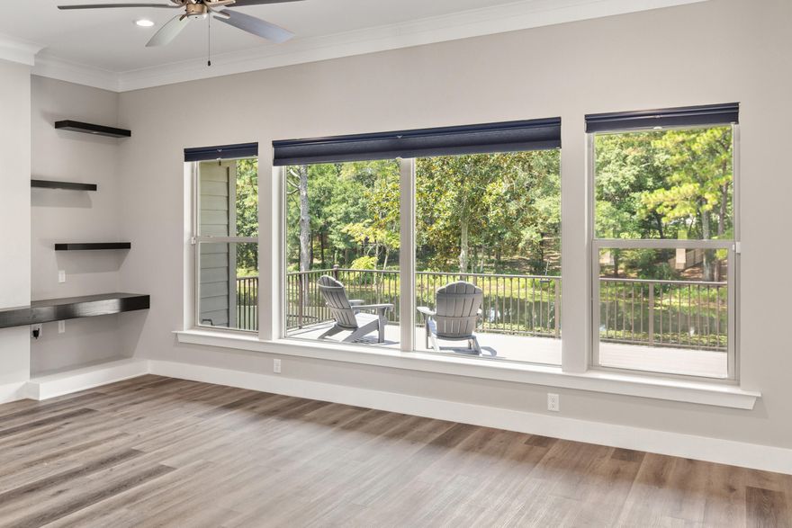 Fabulous assumable VA interest rate opportunity. All brick, 5-bedroom home in the heart of Niceville has 100' of lake frontage on Pine Lake. Custom designed contemporary home by Gary Miller Homes in 2021. This neighborhood rarely experiences the opportunity to purchase in.  No HOA dues is another reason to consider this location along with walking distance to Palm Plaza and Niceville High School. Open floor plan awaits you as soon as you open the 8ft tall front door. The kitchen has an oversized breakfast counter overlooking the living room, Plenty of storage in these 42'' tall kitchen cabinets. Granite counters and a full suite of stainless-steel appliances. Large picture windows allow tons of natural lighting to come in! Large Master bedroom has a trayed ceiling...... Click ''Read More and boasts a larger master bathroom with alarge soaking tub, double sized walk-in shower, shaker style double vanities and his and her walk-in closets. The two primary guest rooms split with a Hollywood bathroom. The third bedroom is located just off the kitchen with its own bathroom. Perfect as a guest quarter or could easily be used as a mother-in-law suite. Roomy laundry room has a walk-in pantry, space enough to add a bank of cabinets to sort and fold laundry as well as still having room for a chest or upright freezer. Leading out to the garage there is a mudroom area just outside of two more bedrooms. Convenient location for the placement of book bags, upcoming winter coats, galoshes for the rainy days we are experience. 2 Car side entry garage and loads of extra driveway parking rock this property. The 18 x 24 open deck allows a great viewing area where you will catch the wildlife at play most all day long at the lake. The backyard has a privacy fence on both sides and the lake frontage has a newly installed wrought iron fence.  The lawn pump draws from the lake to maintain the yard.