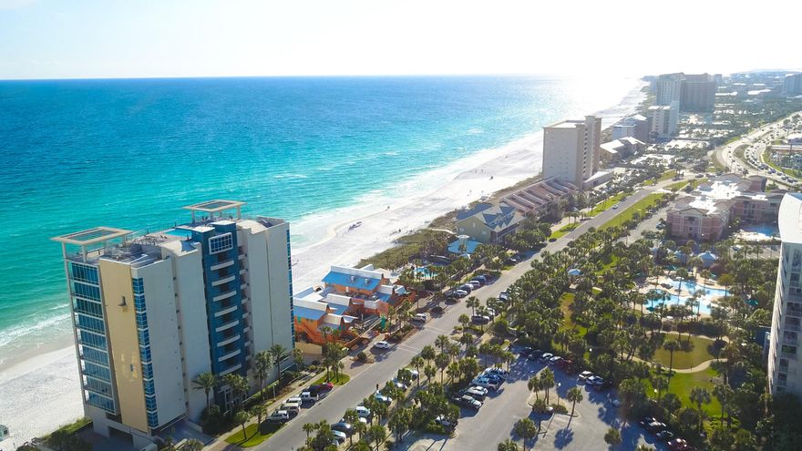 Exquisite beachfront condo with breathtaking Gulf views. Signature Beach is a private, owner occupied building with no short term rentals allowed. This particular unit features a large balcony on the preferred West side of the building, overlooking the Gulf of Mexico, ground to ceiling impact glass windows, built in entertainment cabinet, surround sound, tile flooring, granite counter-tops, private laundry and stainless steel appliances. The master suite opens up to the balcony and offers stunning views. The amenities of Signature Beach include a rooftop infinity pool overlooking the Gulf, beach access, two parking spaces, extra storage, owner pets allowed (some exclusions) and the peace of mind of a top notch security system in place at every entry.