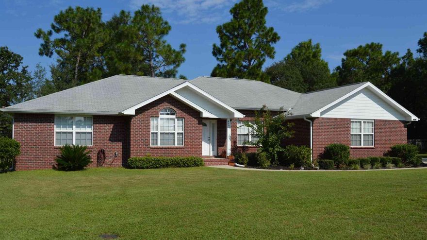 Beautiful custom built brick home ideally situated on a quiet cul-de-sac south of I-10! This 4 bed/2 bath home boasts high ceilings, spacious bedrooms and a gas fireplace for those cozy winter evenings. The spacious kitchen features stainless steel appliances, granite countertops as well as a breakfast bar with a separate nook and pantry too. The master bedroom will amaze you with it's abundance of space which includes a sitting area/desk niche and walk in closet. If you like roomy bathrooms, this house will not disappoint. Both bathrooms have double vanities with the master bathroom featuring a separate shower and a garden tub to relax in. Definitely a home you will want to see!