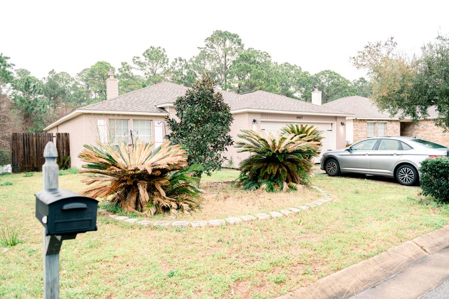 Welcome home to this beautifully remodeled 3-bedroom, 2-bathroom residence with a spacious double-car garage. This home has been thoughtfully updated and is like new, featuring a 2020 Roof, HVAC system, and stunning new flooring throughout Dec 2024. Additionally, the home is equipped with solar panels, providing energy efficiency and long-term savings.**  Step inside to an inviting open floor plan with a vaulted ceiling in the living room, creating a bright and airy atmosphere. The spacious kitchen boasts a breakfast bar, freshly painted cabinetry, quartz countertops, and a designated dining area--perfect for both casual meals and entertaining.  The luxurious master suite includes an en suite bath with a custom tile shower, a relaxing garden tub, a walk-in closet, and elegant quart countertops. Two additional well-sized bedrooms and a fully updated guest bathroom offer plenty of space for family or guests.  

Enjoy seamless indoor-outdoor living with a sliding glass door leading to a large covered patio, perfect for dining al fresco or unwinding on warm Florida evenings.  

Don't miss the opportunity to own this beautifully upgraded homeschedule your showing today!