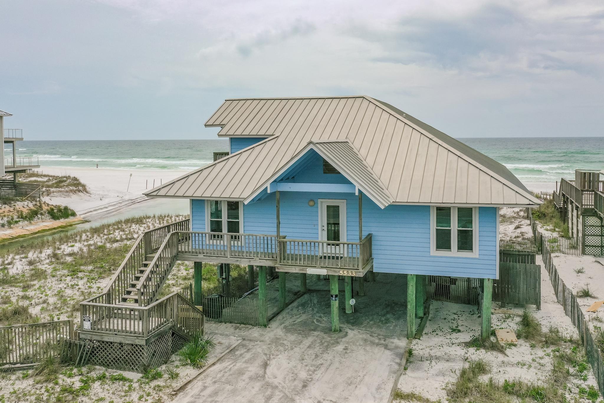 GULF FRONT on 30A with incredible, wide-open views!  ''Lagniappe'' is located in Dune Allen on a large lot, directly on the Gulf of Mexico, with 140+ feet of private beach. Enjoy the gulf breeze and views from the 10'x40' porch across the back of the home. The open floorplan, living, dining, and kitchen span 40 feet, offering beautiful views from the inside or outside. There are four bedrooms, all on the main level, each with an en-suite bath and king-size bed. The large bonus room upstairs has two trundle beds and a pullout sleeper sofa, along with a deck overlooking the Gulf. Upgrades include stainless steel appliances, granite countertops, and tile floors in the kitchen.  Excellent rental history! Sold furnished with the exclusion of some personal items. All information to be verified