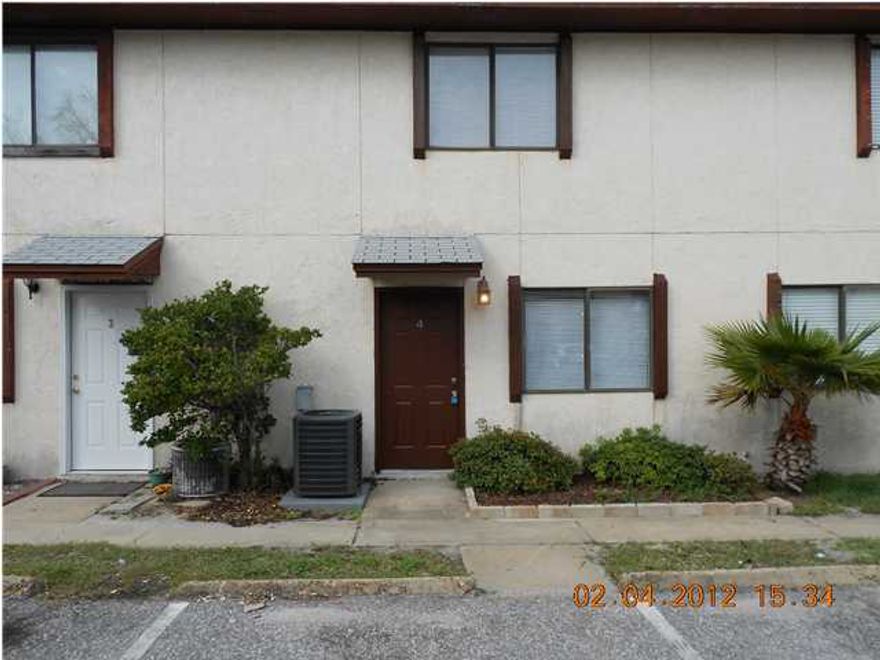 Just listed. Located just off Airport Rd. Mexican tile flooring downstairs for easy care. Carpet in bedrooms. Back yard has pavers and great for entertaining and low maintainence. Close to beaches and shopping. All new appliances with washer and dryer and new countertops. And new a/c. NO PETS!!!!! .