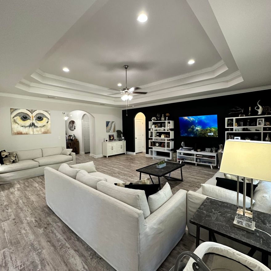 Discover your dream home at 638 Cornelia Street in Freeport, FL. Priced at $535,000, this 2,368 sq. ft. Craftsman-style residence with upgraded coastal-colored LVT flooring and granite countertops is located on a fenced premium lot features 4 bedrooms, 2.5 baths, and an open-concept living, kitchen and dining area creating a very spacious feeling.  The living area with additional area for family gaming enhances the living space.  The spacious kitchen with Island overlooking the living area and dining, is perfect for entertaining or gathering with family and friends.  The kitchen is a culinary delight for those who love to cook and entertain as it boasts stainless steel appliances, including a five-burner gas stove/range, dishwasher, microwave, and large walk-in pantry. The master suite boasts a large walk-in closet and luxurious bath including a tiled shower, soaking tub and a double sink vanity. The home also features three more nicely sized bedrooms, offering comfort and space.  The oversized laundry features additional storage.  Enjoy upgraded interiors and a private fully fenced backyard that is deep and backs onto treeline for added privacy for family fun. Nestled in the amenity-rich Hammock Bay community, residents have access to pools, RV/boat storage, sports courts, a clubhouse, trails, bay pier and more. The Resort Style Living at Hammock Bay features two zero-entry pools, a 10,000 sq. ft. clubhouse, and a rentable event center.  Active Lifestyle amenities include tennis, pickleball, basketball courts, a movie theater, and trails for hiking and biking.  For family fun there is a large playground and access to the Freeport Sports Complex that caters to all ages.  You can have peace of mind with the gated community with security guards to ensure safety and privacy.  Embrace the charm of Freeport, with its natural beauty, small-town atmosphere, and a friendly community with a laid-back lifestyle. Explore Florida's recreational paradise and natural beauty thanks to its warm subtropical climate and close proximity to beaches, state parks, and the stunning Choctawhatchee Bay.  Freeport is a burgeoning area offering a mix of tourism, real estate, and local businesses.  Your New Life Awaits!  Embrace the luxury and comfort of 638 Cornelia Street, a home that brings together modern amenities, community spirit, and the serene beauty of Freeport, FL. Don't miss your chance to make this dream home yours!