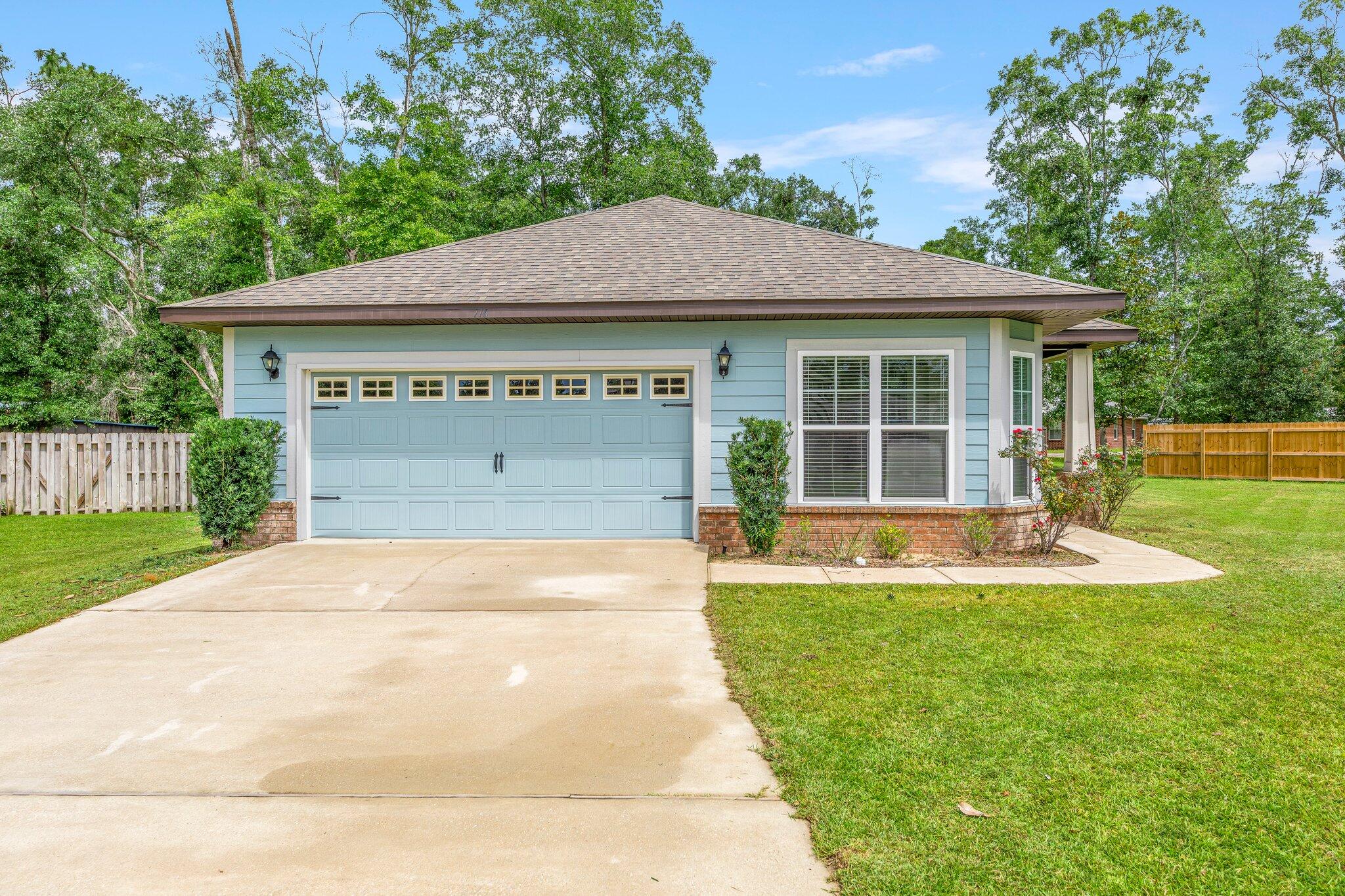 10,000 towards closing costs. Great investment opportunity. If you have been dreaming of a large back yard w/potential for a great outside area w/ a barbeque or your own pool this is the house for you. Adorable Craftsman Cottage in The Canopies. This 3 bedroom, 2 Bath home is conveniently located in the heart of Freeport, close to schools, 5 minutes to Publix, and 20 minutes to beaches. 8-foot exterior doors open into the home and LVP flooring flows in the living room, kitchen and dining area. The kitchen has stainless steel appliances, granite counters, and beaded cabinets. The master bedroom has access to the back patio and a trayed ceiling. Be sure you check out the community pool and playground that's just down the street. You don't want to miss this opportunity.